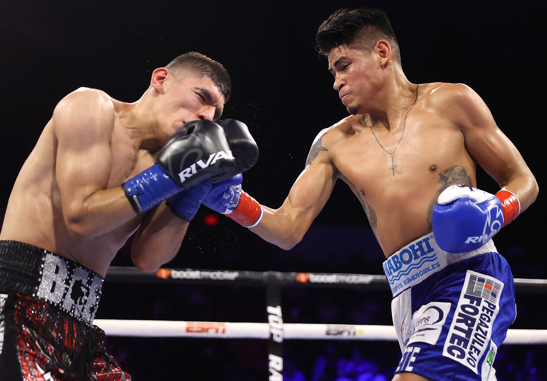Emanuel Navarrete Rallies Against Baez With Body-Shot KO