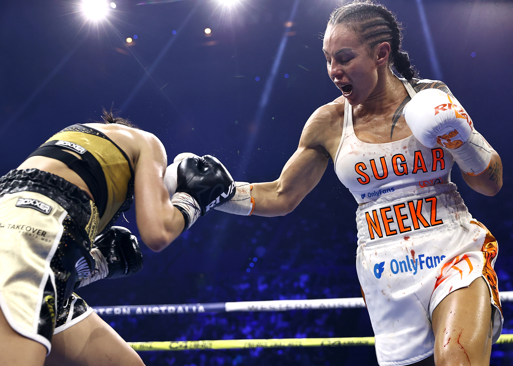 Cherneka Johnson Defeats Nina Hughes in Close Decision